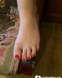 Smoking babe loves to show off her feet