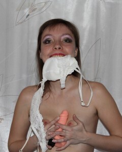 Kinky stepsister in fishnets uses a toy