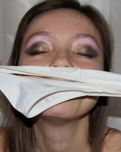 Kinky stepsister in fishnets uses a toy