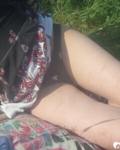 Horny beauty showing her ass in the countryside