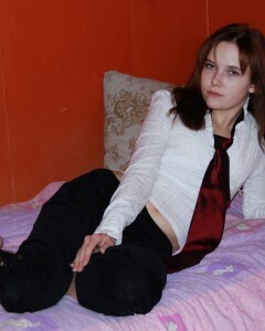 Schoolgirl showing off her stunning naked body