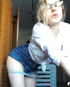 Perfect blonde with glasses shows her beautiful pussy