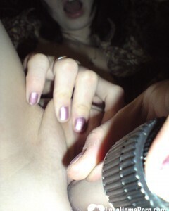 Smoking wife using a long metal dildo