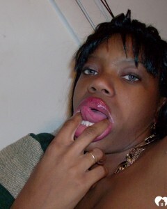 Ebony beauty strips off her fishnet shirt