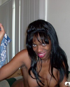 Ebony beauty strips off her fishnet shirt