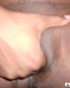 Ebony beauty strips off her fishnet shirt