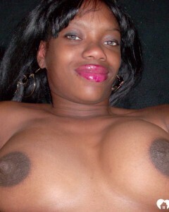 Ebony beauty strips off her fishnet shirt