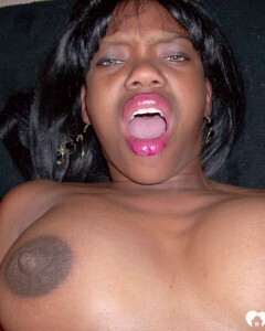 Ebony beauty strips off her fishnet shirt