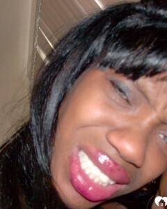 Ebony beauty strips off her fishnet shirt