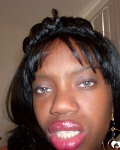 Ebony beauty strips off her fishnet shirt