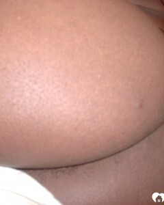 Ebony beauty strips off her fishnet shirt