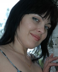 Lusty mom in lingerie posing in the woods