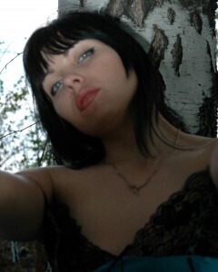 Lusty mom in lingerie posing in the woods