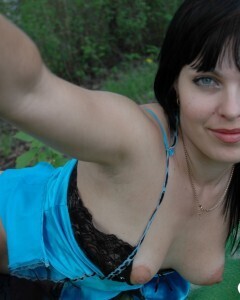 Lusty mom in lingerie posing in the woods