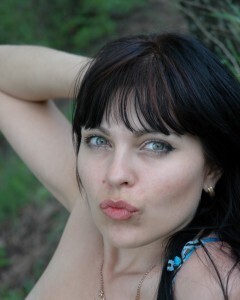 Lusty mom in lingerie posing in the woods