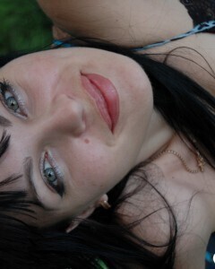 Lusty mom in lingerie posing in the woods