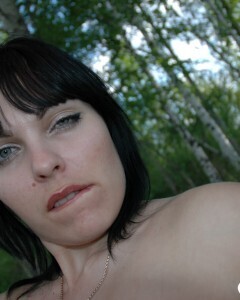 Lusty mom in lingerie posing in the woods