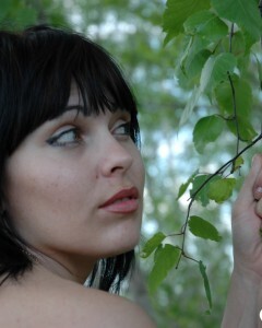 Lusty mom in lingerie posing in the woods