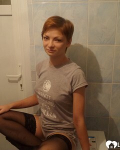 Babe in stockings taking selfies in the bathroom