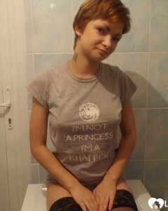 Babe in stockings taking selfies in the bathroom