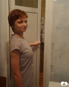 Babe in stockings taking selfies in the bathroom