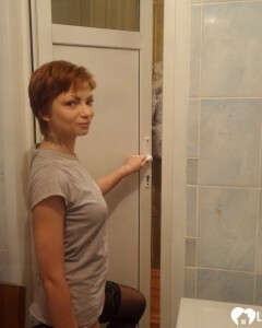 Babe in stockings taking selfies in the bathroom