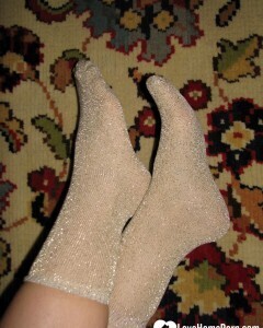Nerdy babe keeps her sparkly socks on