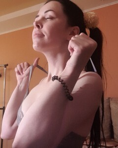 Brunette with pigtails poses in knee socks