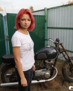Redhead babe really likes my new bike