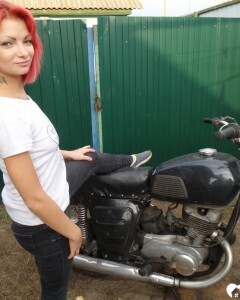 Redhead babe really likes my new bike