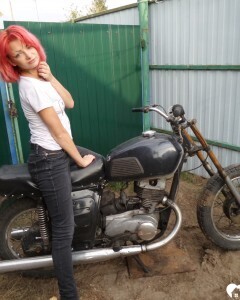 Redhead babe really likes my new bike