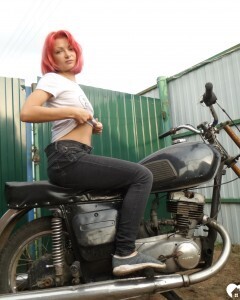 Redhead babe really likes my new bike