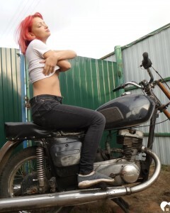 Redhead babe really likes my new bike