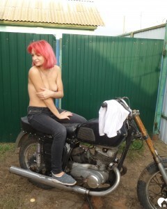 Redhead babe really likes my new bike