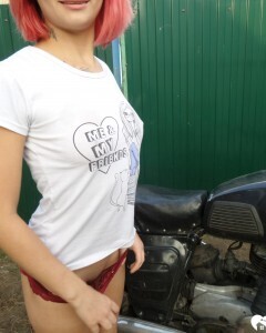 Redhead babe really likes my new bike