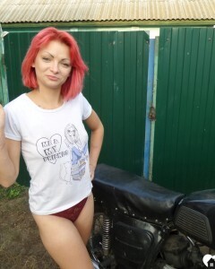 Redhead babe really likes my new bike