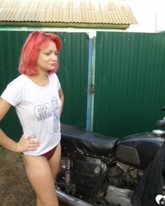 Redhead babe really likes my new bike