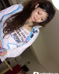 Stunning Asian gets completely naked on camera