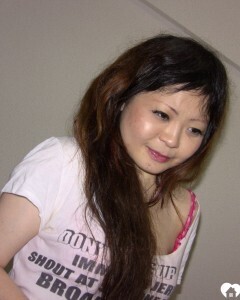 Stunning Asian gets completely naked on camera