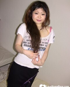 Stunning Asian gets completely naked on camera