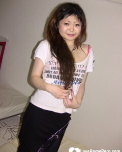 Stunning Asian gets completely naked on camera