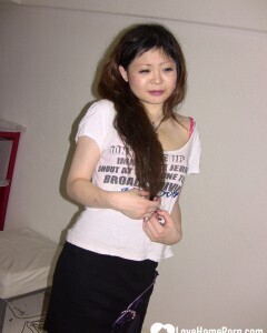 Stunning Asian gets completely naked on camera