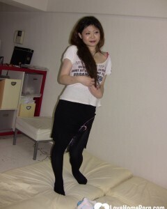 Stunning Asian gets completely naked on camera