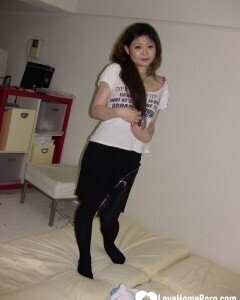 Stunning Asian gets completely naked on camera