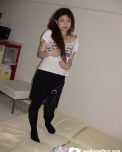 Stunning Asian gets completely naked on camera