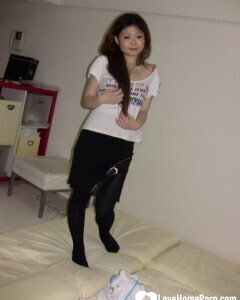 Stunning Asian gets completely naked on camera