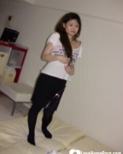 Stunning Asian gets completely naked on camera