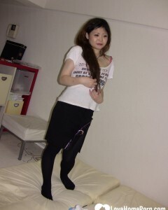 Stunning Asian gets completely naked on camera