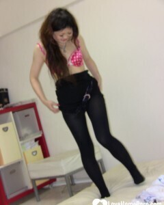 Stunning Asian gets completely naked on camera