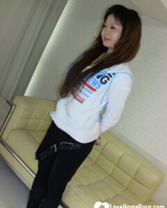 Stunning Asian gets completely naked on camera